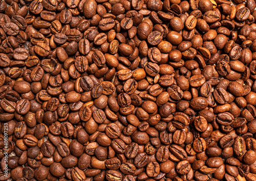 Coffee beans as an abstract background. Coffee grains close up.