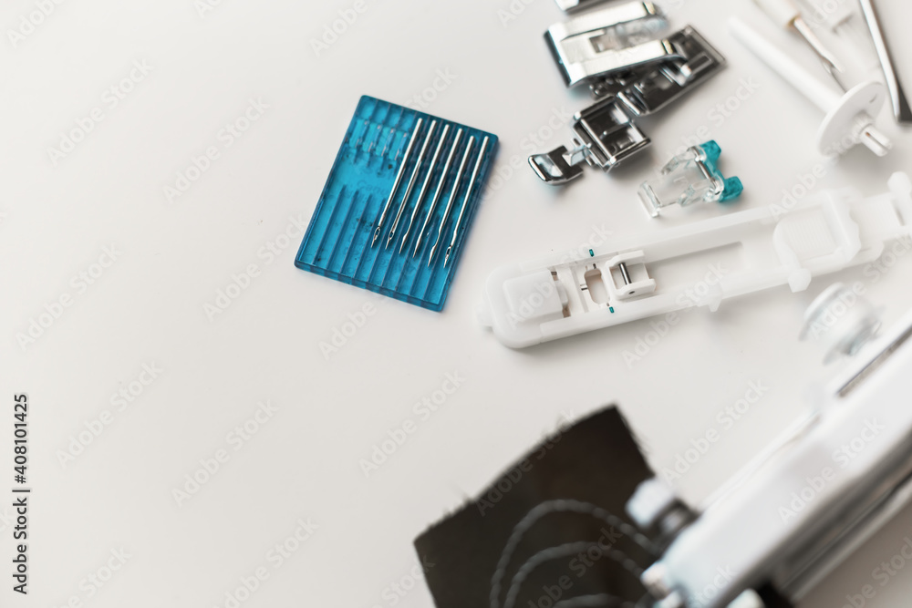 a set of tools for sewing. Flat lay top-down. Hand made. Set of monochrome bright blue elements for sewing. Isolated on white background. Sewing items knolling on white background