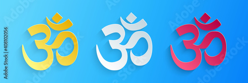 Paper cut Om or Aum Indian sacred sound icon isolated on blue background. The symbol of the divine triad of Brahma, Vishnu and Shiva. Paper art style. Vector.
