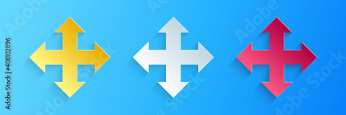 Paper cut Arrows in four directions icon isolated on blue background. Paper art style. Vector.