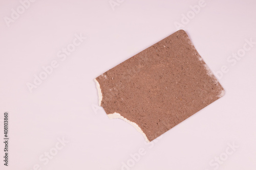 top view from an angle on a brown rectangle with a jagged edge