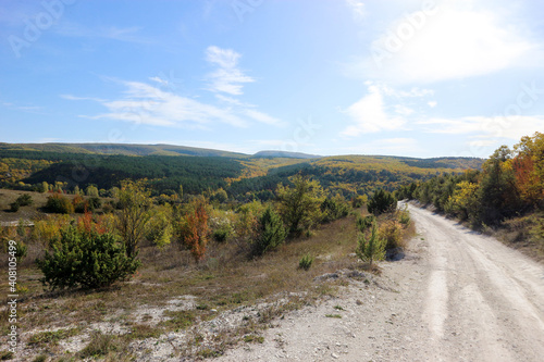 beautfiul view of mountain road in autumn with colorful forest