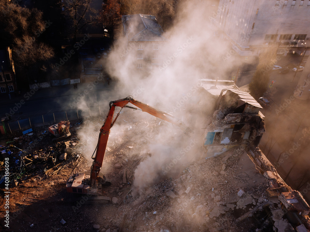 Obraz premium Aerial view of demolition site. Process of demolition of old industrial building