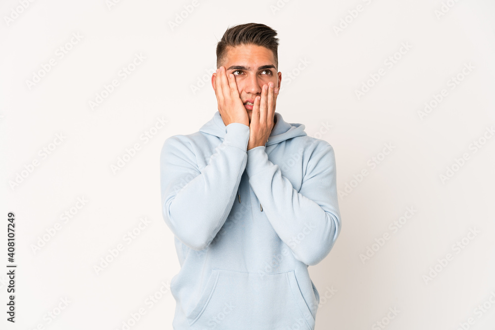 Young caucasian handsome man isolated whining and crying disconsolately. Young caucasian handsome man isolated whining and crying disconsolately.
