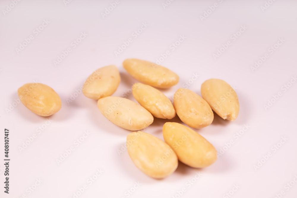 nine peeled almonds in the center of the frame nine peeled almonds in the center of the frame