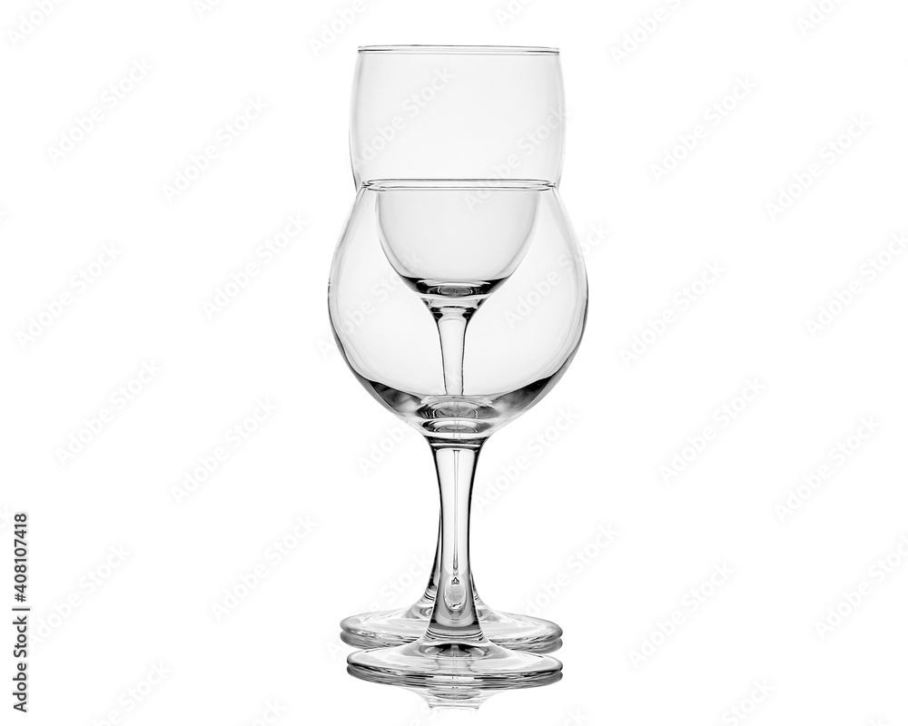 Two empty wine glasses overlapped isolated white. Two empty wine glasses overlapped isolated white.