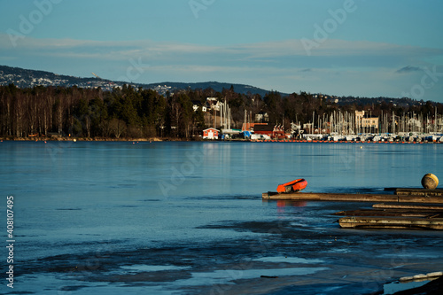 Outdoors at Kalvøya, Sandvika, Bærum, Norway. Ice cold winter day, but the sun is shining and is heating a little bit. 