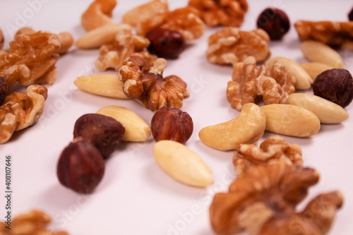 hazelnuts, cashews, walnuts and almonds mixed in front view