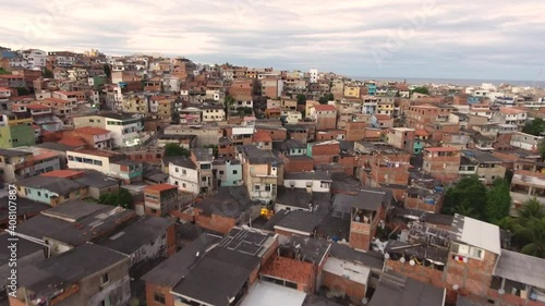Favela drone image at sunset, hilltop in Brazil
