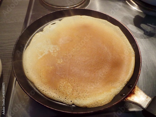 baking pancakes in pan, close up