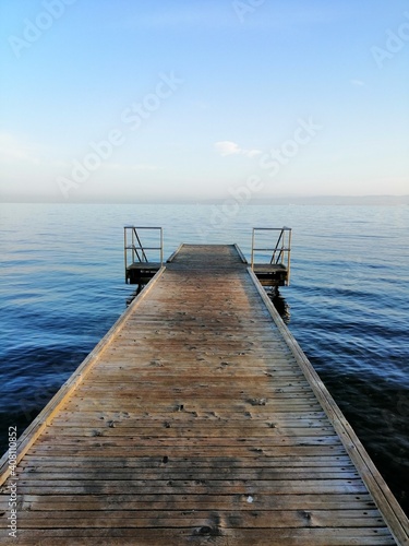 wooden pier on the sea  bright blue sky  morning  Slovenia  Isola  Izola