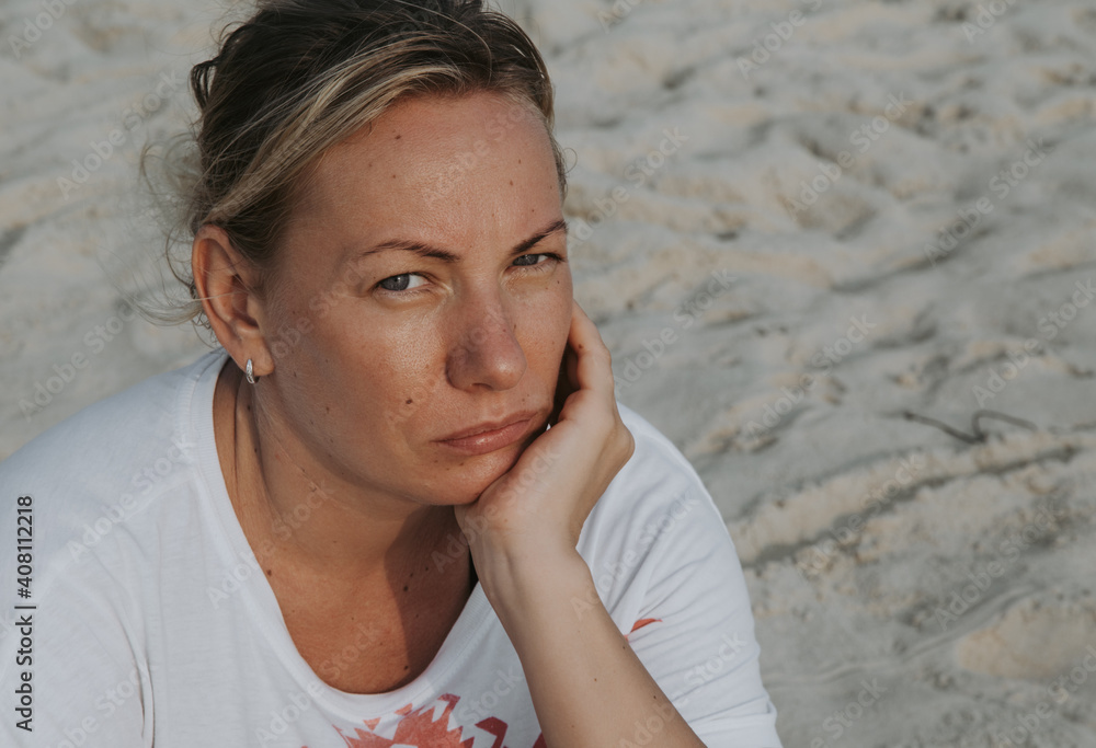 Caucasian middle age woman in a bad mood, upset woman, grumpy face, psychological problems Caucasian middle age woman in a bad mood, upset woman, grumpy face, psychological problems