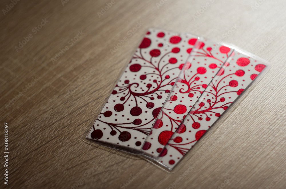 metallic bookmarks on the table metallic bookmarks on the table