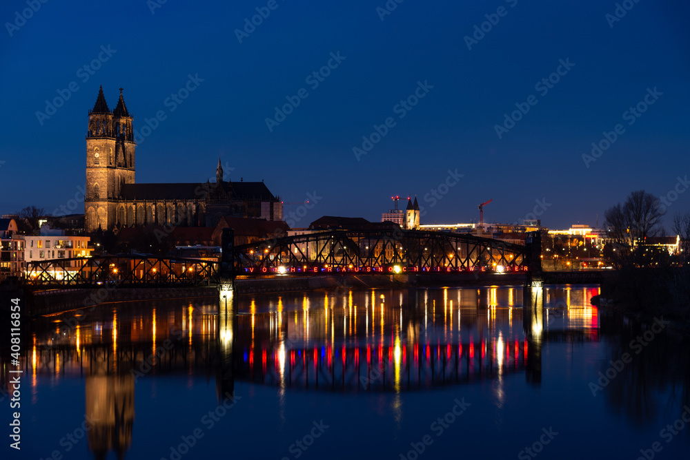 Magdeburg at night with reflections
