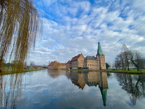 RAESFELD, GERMANY, 14.01.2021 - Castle of Raesfeld illuminated by the winter sun.