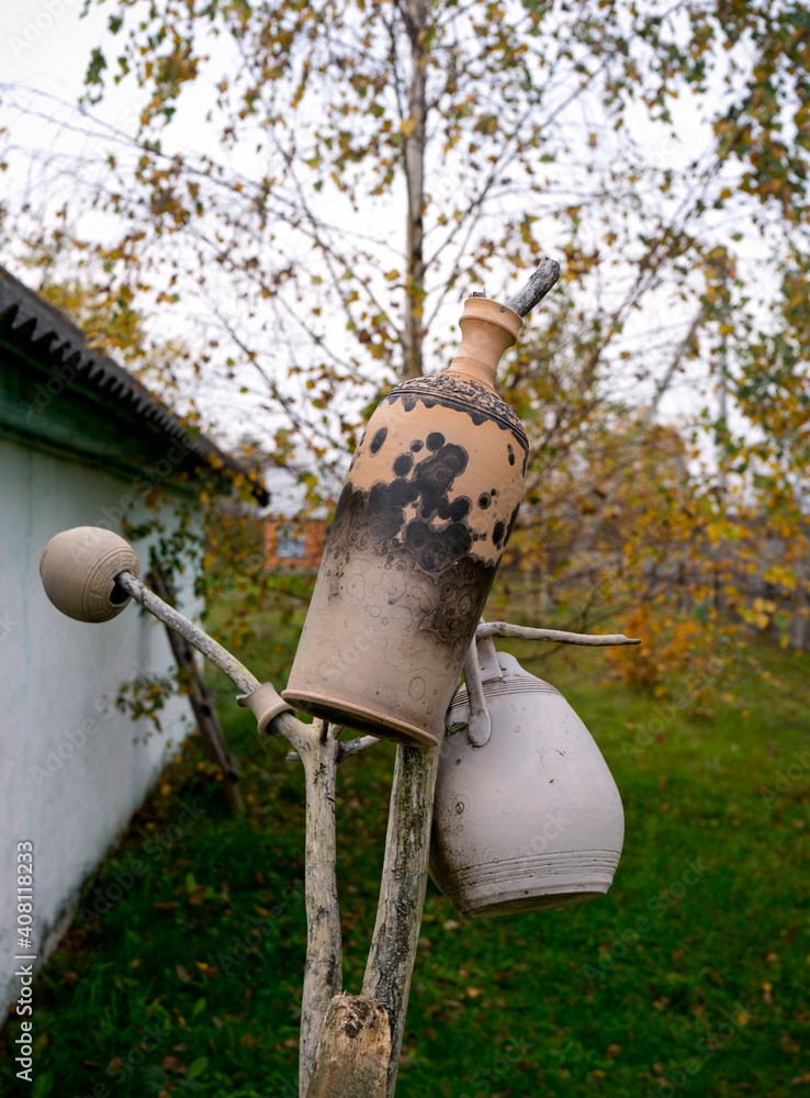 handmade rustic terracotta pots vases on old branch display handmade rustic terracotta pots vases on old branch display