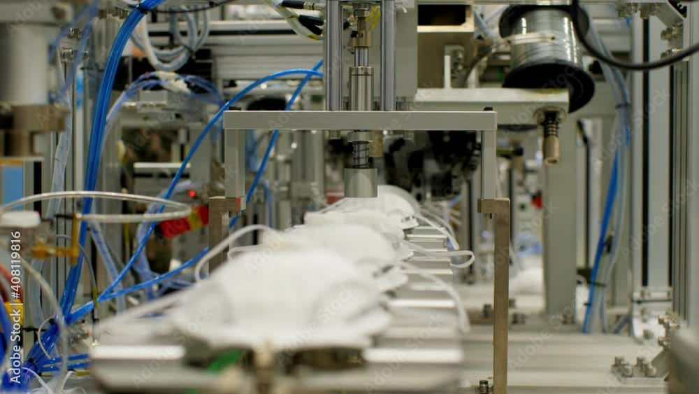 Equipment installs breathing valves to respirators at plant Equipment installs breathing valves to respirators at plant