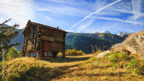 Wooden hut house in the swiss alps wallis, switzerland blue sky matterhorn alps, alpine old landscape