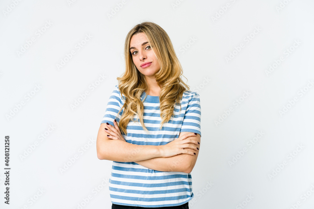Young caucasian blonde woman unhappy looking in camera with sarcastic expression. Young caucasian blonde woman unhappy looking in camera with sarcastic expression.