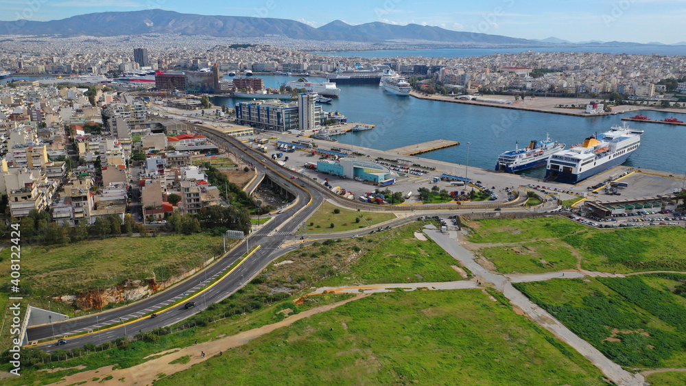 Aerial drone photo of busy port of Piraeus, the largest in Greece and one of the largest passenger ports in Europe as seen from old fertiliser factory, Attica, Greece 