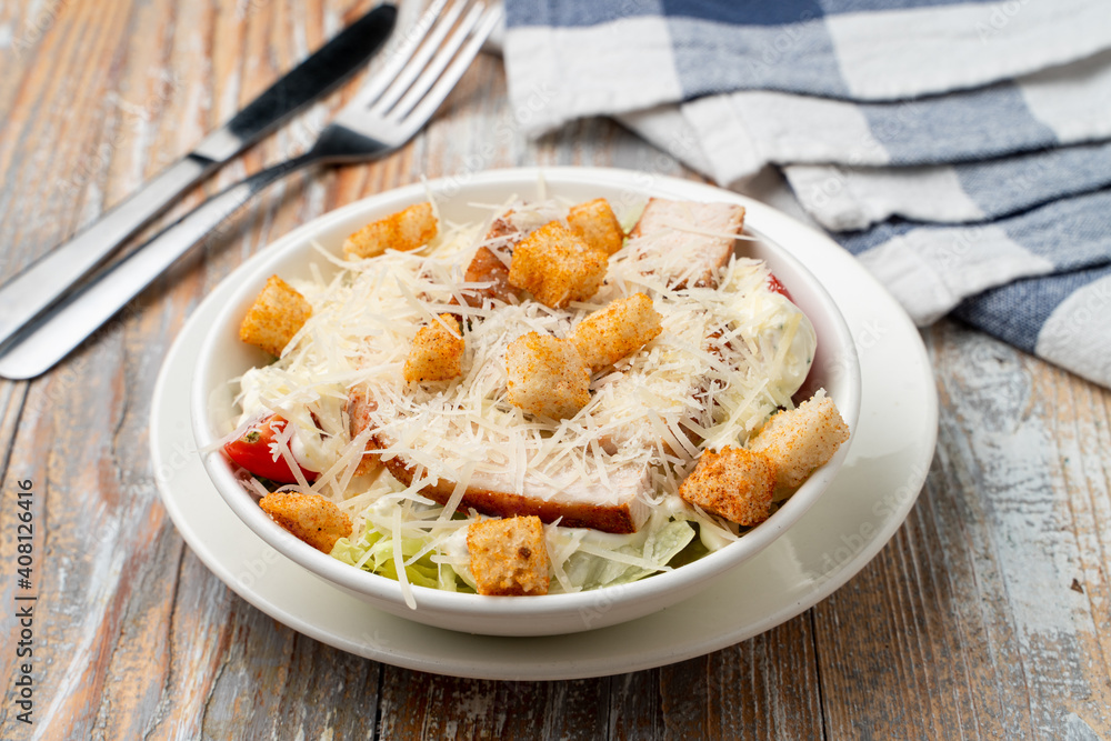 Caesar salad with chicken breast, clean light photo Caesar salad with chicken breast, clean light photo