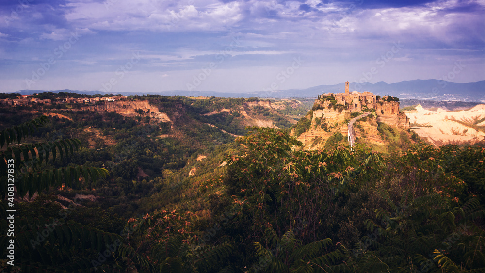 Beautiful panoramic view of famous Civita di Bagnoregio with Tiber valley at sunset, Lazio, Italy