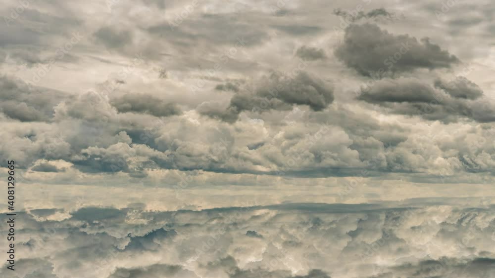 futuristic background consisting of Time lapse clip of white fluffy clouds over blue sky and their reflection, video loop futuristic background consisting of Time lapse clip of white fluffy clouds over blue sky and their reflection, video loop