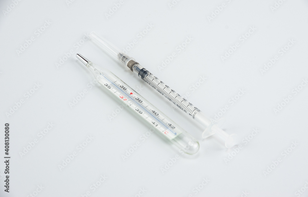 Medical syringe and thermometer, COVID - 19 Coronavirus Medical syringe and thermometer, COVID - 19 Coronavirus