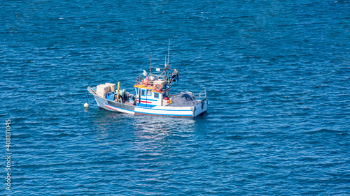 Fishing boat working in the sea