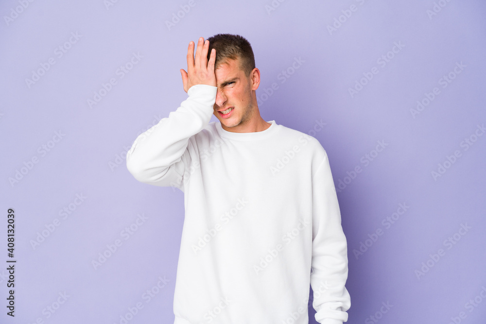 Young caucasian handsome man forgetting something, slapping forehead with palm and closing eyes. Young caucasian handsome man forgetting something, slapping forehead with palm and closing eyes.