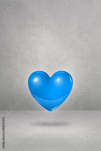 3D blue heart on a concrete studio background