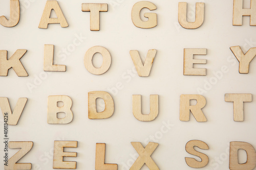 wooden alphabet soup including the word "love" and "amor"
