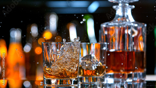 Fresh whiskey in a bar spla...