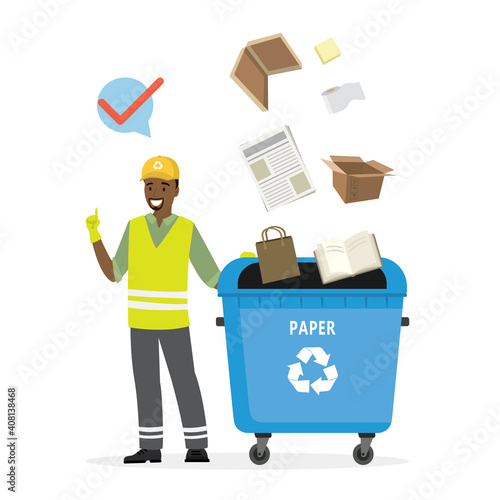 Separate garbage collection. African american man in uniform stands near trash can. Paper and cardboard items fall in separate tank.