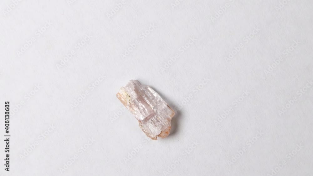 Kunzite gemstone on turn table Kunzite gemstone on turn table