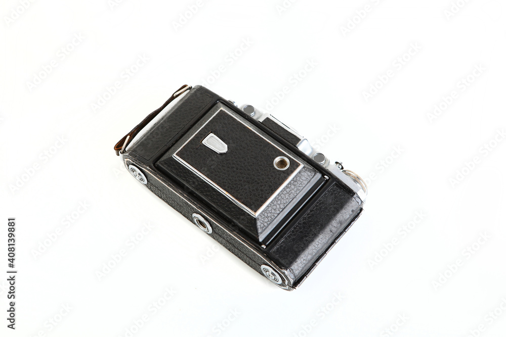 Old medium format rangefinder camera on white background. Old medium format rangefinder camera on white background.