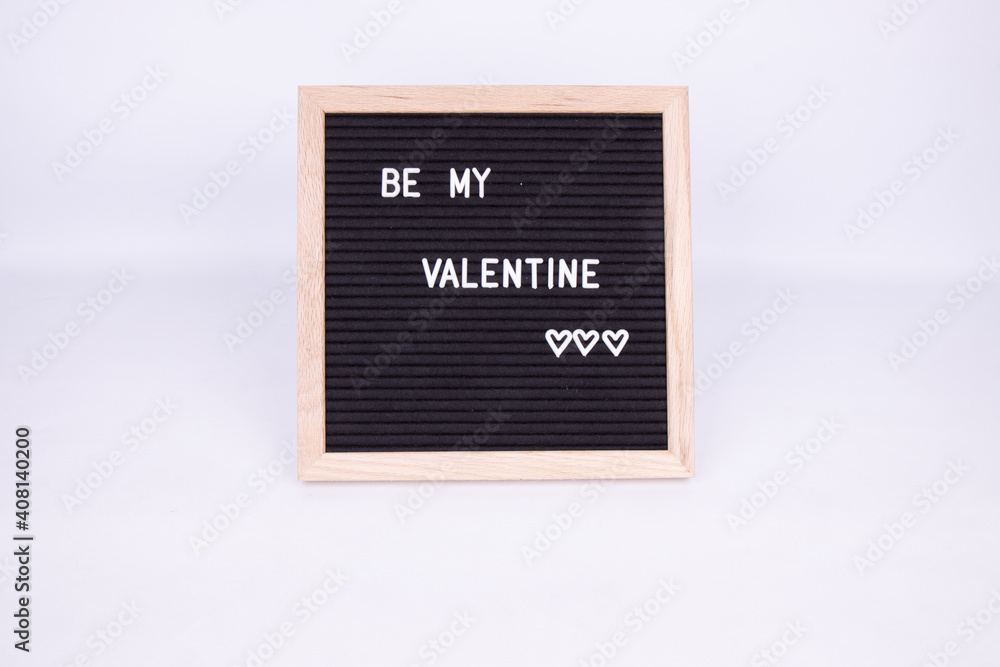 A sign that says Be My Valentines on a white background
