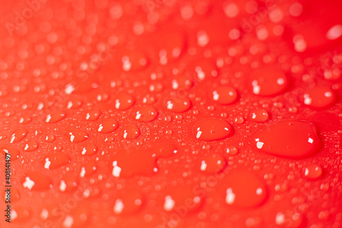 Water drops on a red background