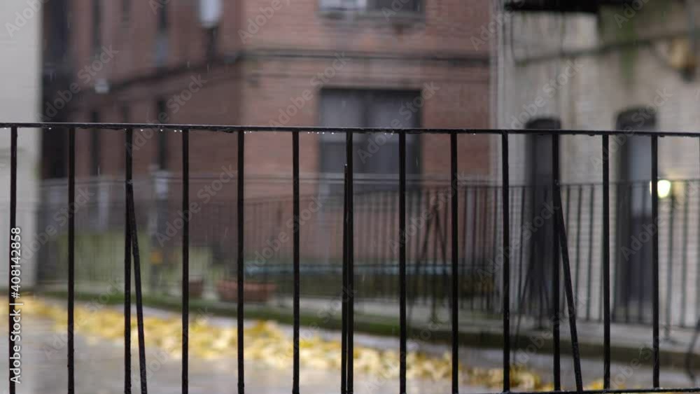 Balcony Steel Railing getting wet under the falling of gentle snowflakes in Brooklyn, New York - Medium Static shot Balcony Steel Railing getting wet under the falling of gentle snowflakes in Brooklyn, New York - Medium Static shot