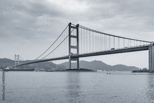 Suspension bridge to Park island. Hong Kong.