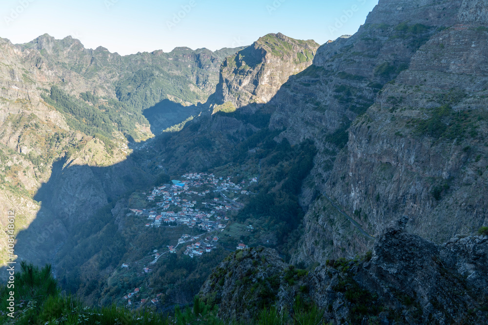 Eira do Serrado - with breathtaking views of its surrounding mountains and the village in Curral das Freiras. Madeira island Eira do Serrado - with breathtaking views of its surrounding mountains and the village in Curral das Freiras. Madeira island