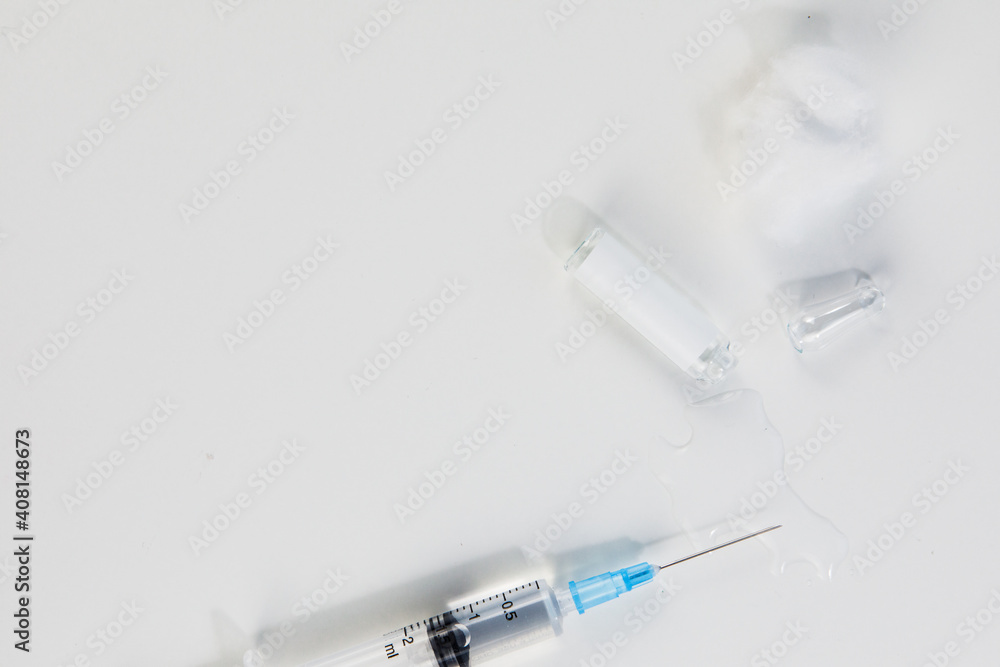 view of syringe with vaccine ampoules view of syringe with vaccine ampoules