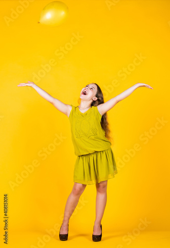 express positivity. kid summer fashion. cheerful day dreamer. fashion and beauty. her perfect hairstyle look. smiling child with party balloons. childhood happiness. pretty teenage girl in dress