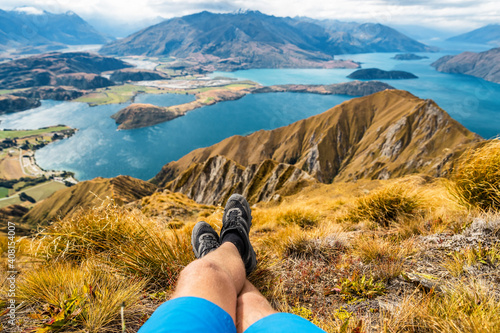 Canvastavla Adventure and hiking wanderlust travel vacation concept with hikers hiking boots close up