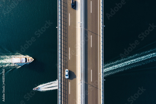 Aerial view on road. Bridge above sea. View from a drone. Natural landscape i...