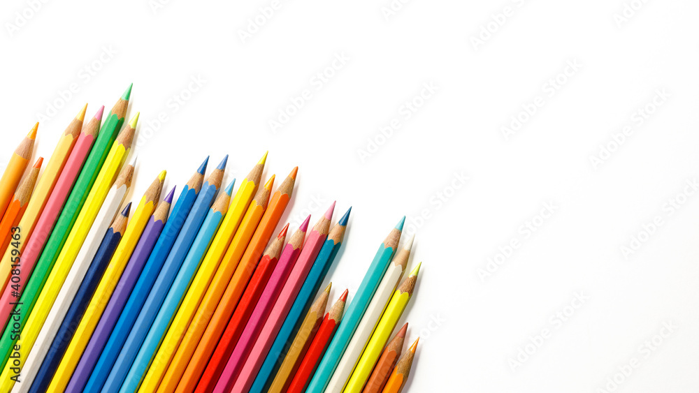 Fototapeta premium Closeup of colored pencils isolated on white, top view