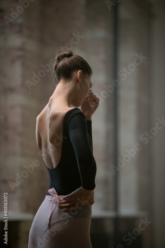 Ballerina standing in dance studio