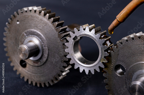 Coating gears with oil. Accessories and spare parts for industrial machinery.
