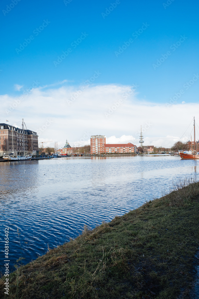 Port city in northern Germany. Small port in Europe. Residential buildings in port