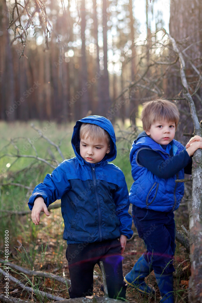 True men friendship, outing of crowed places. Two kids giving high five each other for support True men friendship, outing of crowed places. Two kids giving high five each other for support